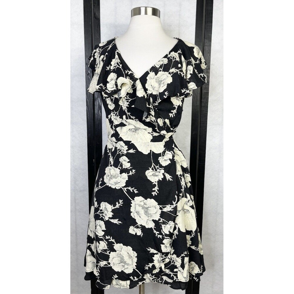 Free People Synthetic French Quarter Wrap Dress. Size: M